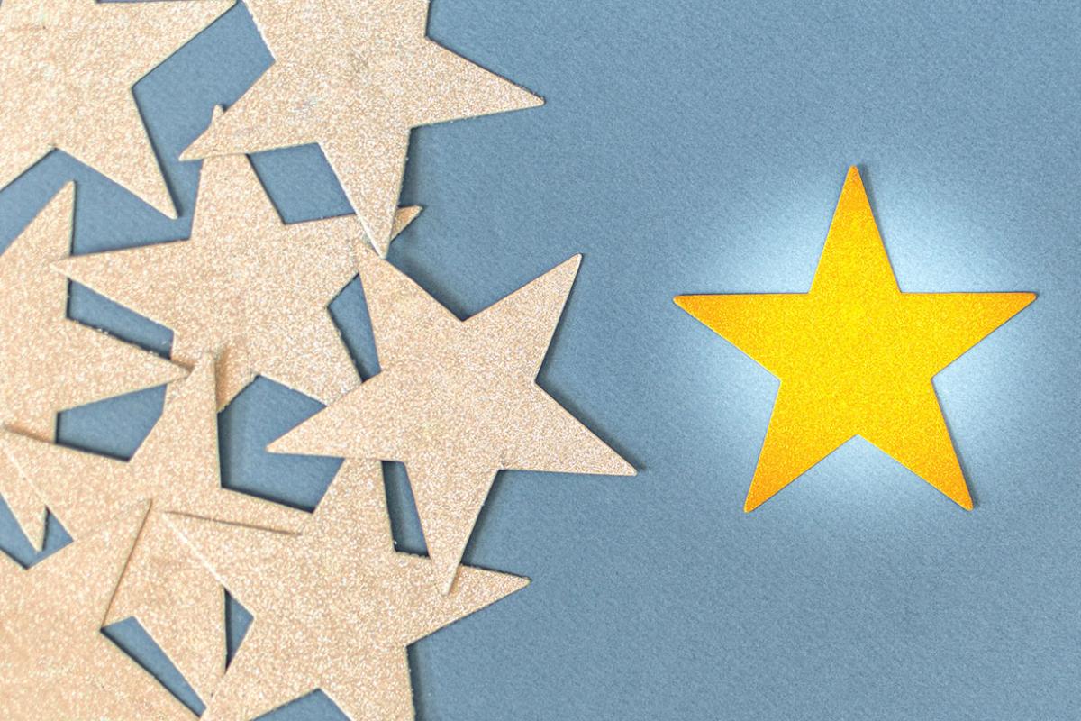 Group of stars with one a different color