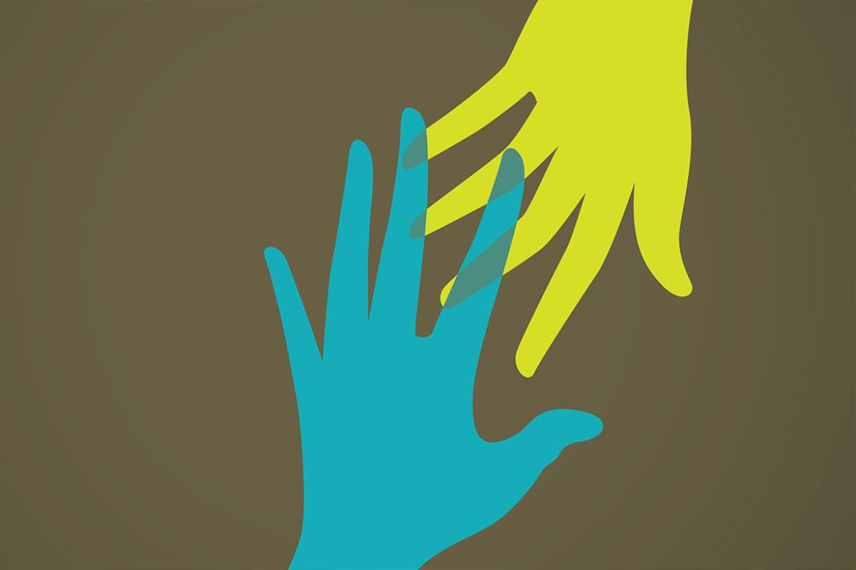 Two hands reaching to connect