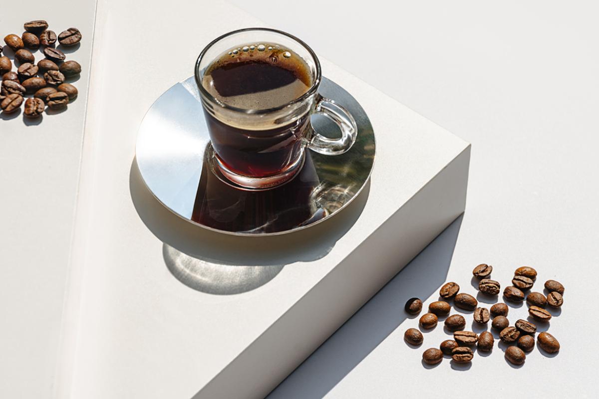 Cup of coffee and coffee beans