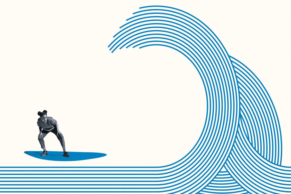 Young person surfing on a wave