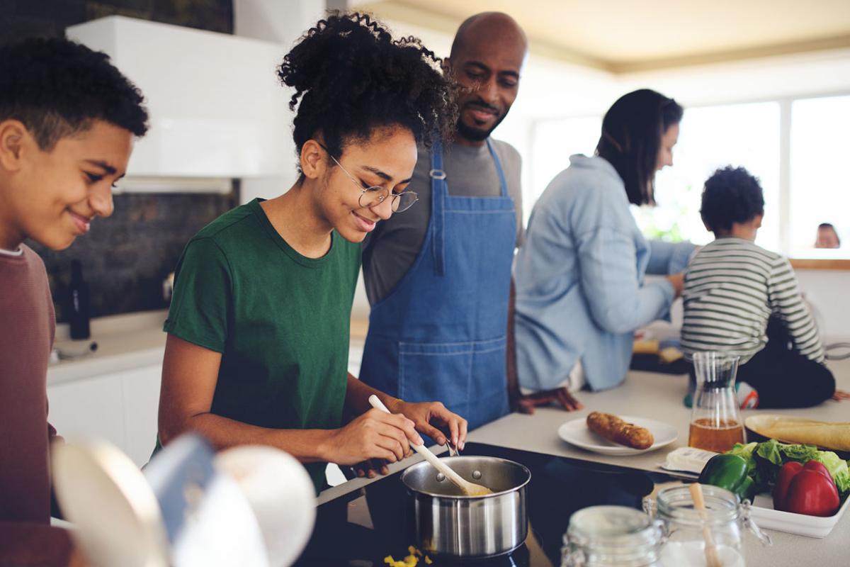 Family making a meal together