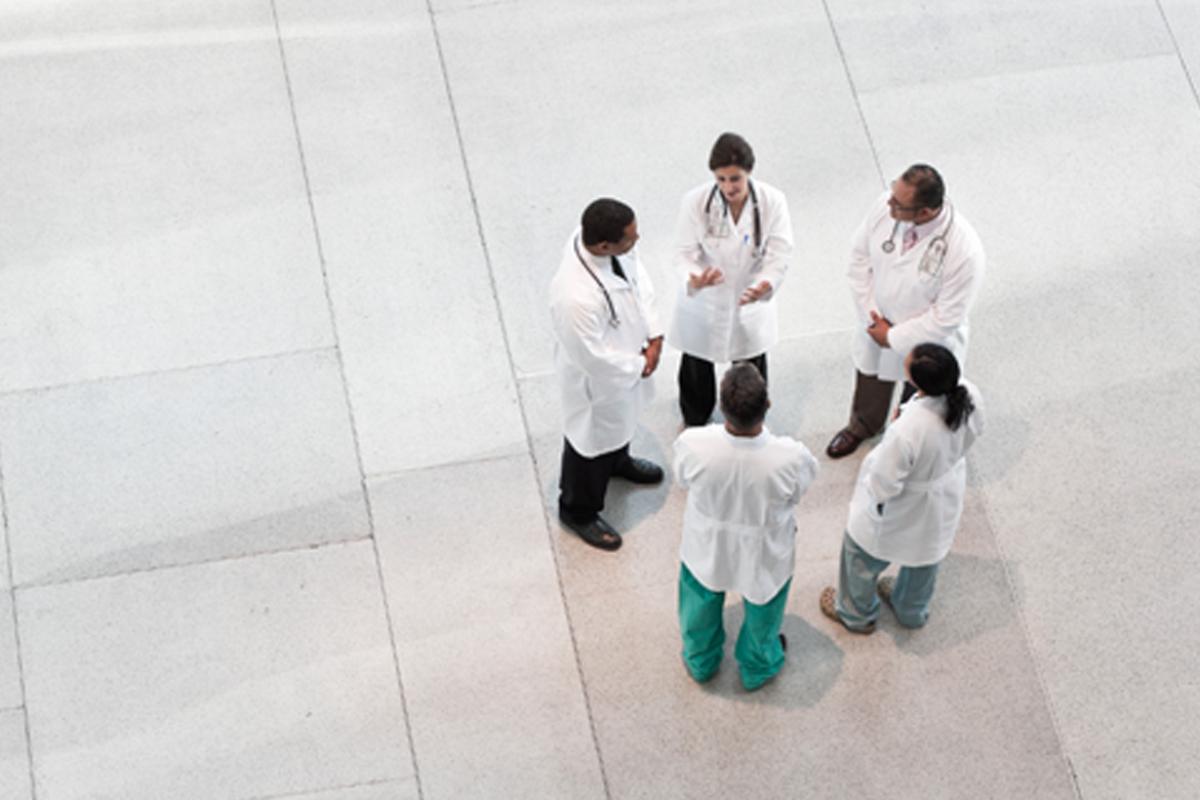 Circle of health care workers in discussion