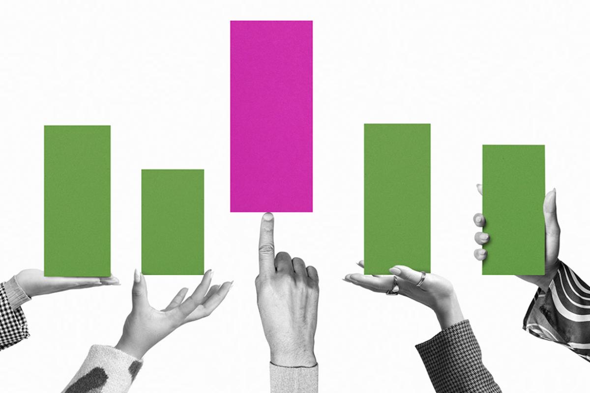 Hands holding up columns of bar graph
