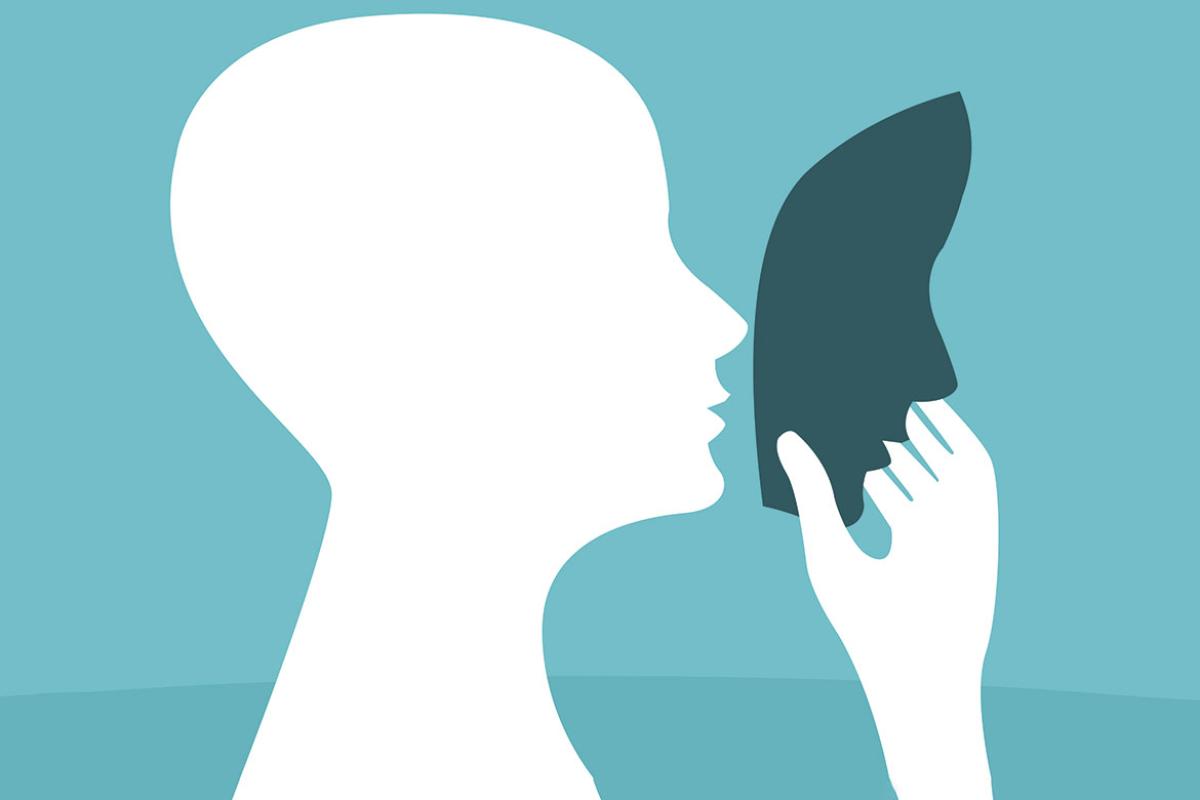 Profile of a person holding a mask