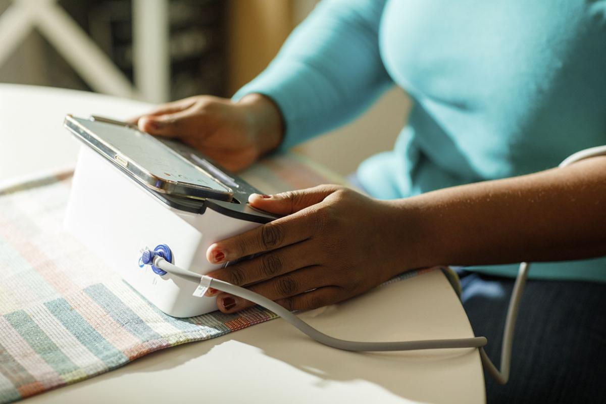 Person checking their blood pressure