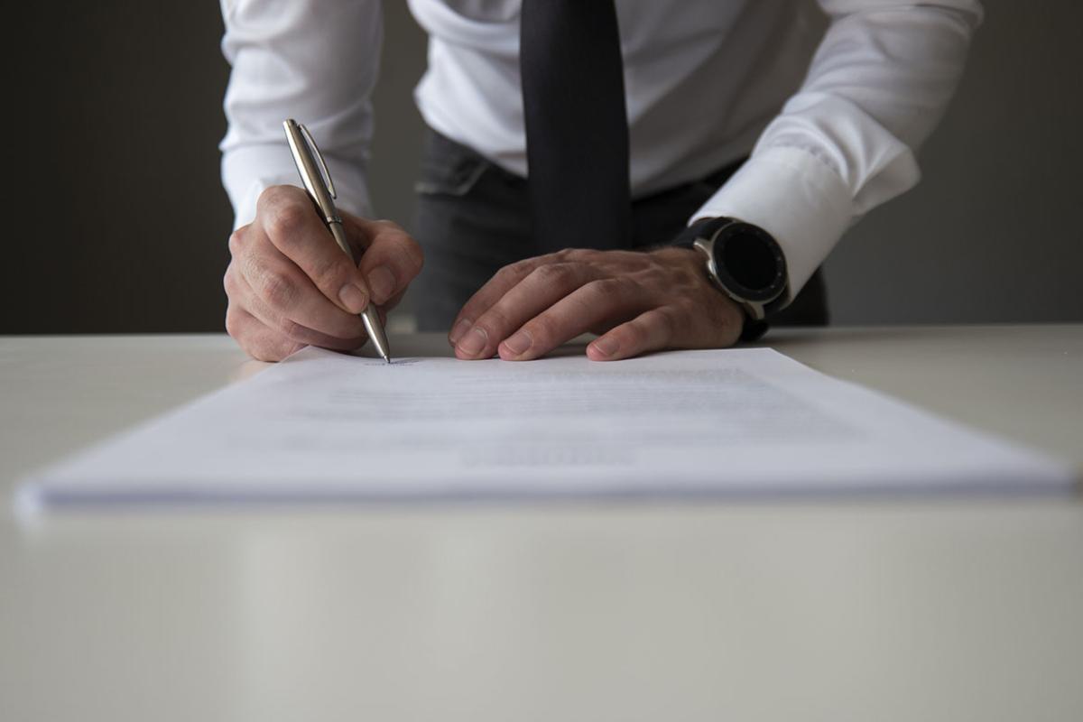 Person signing a document