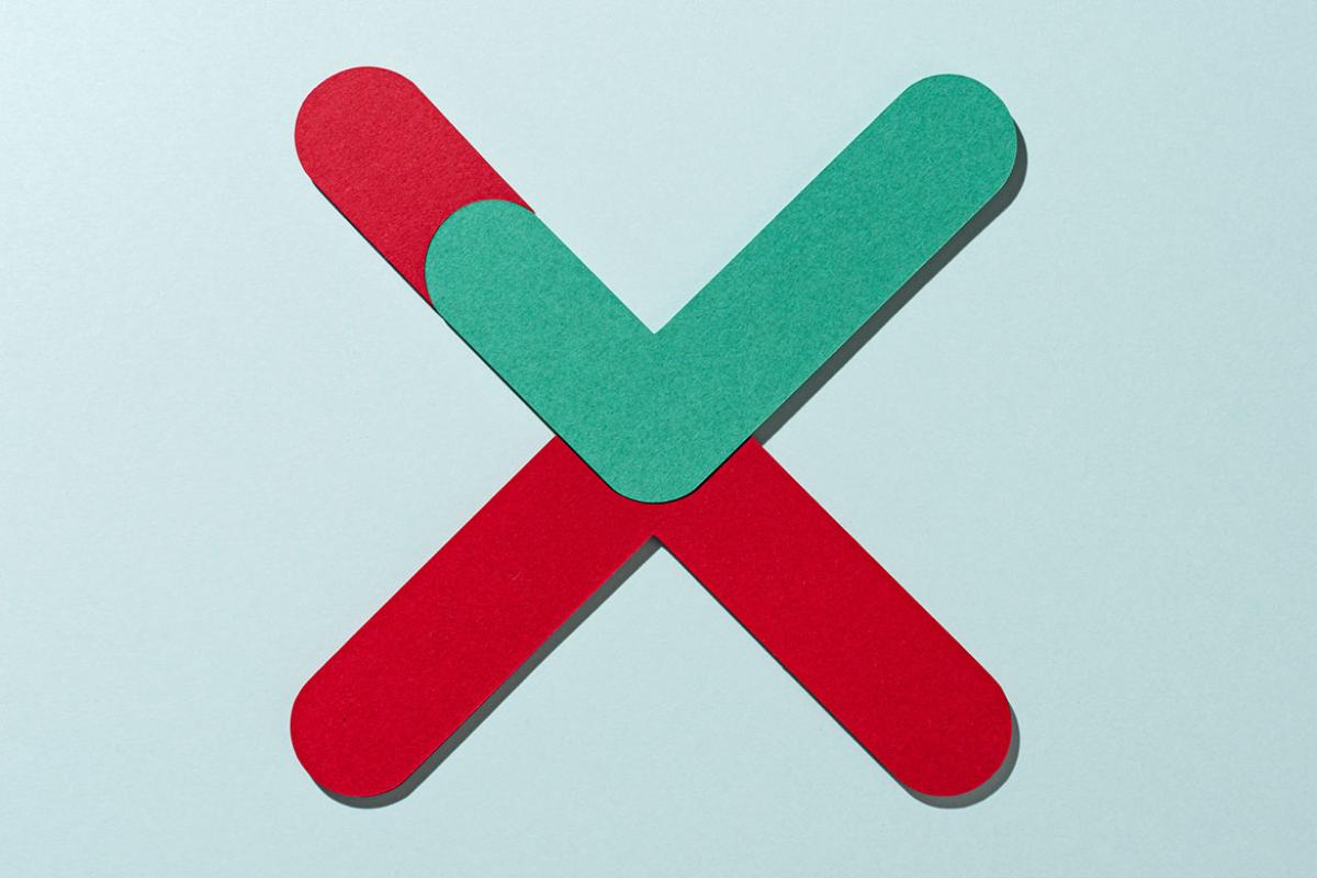 Two check marks forming an X