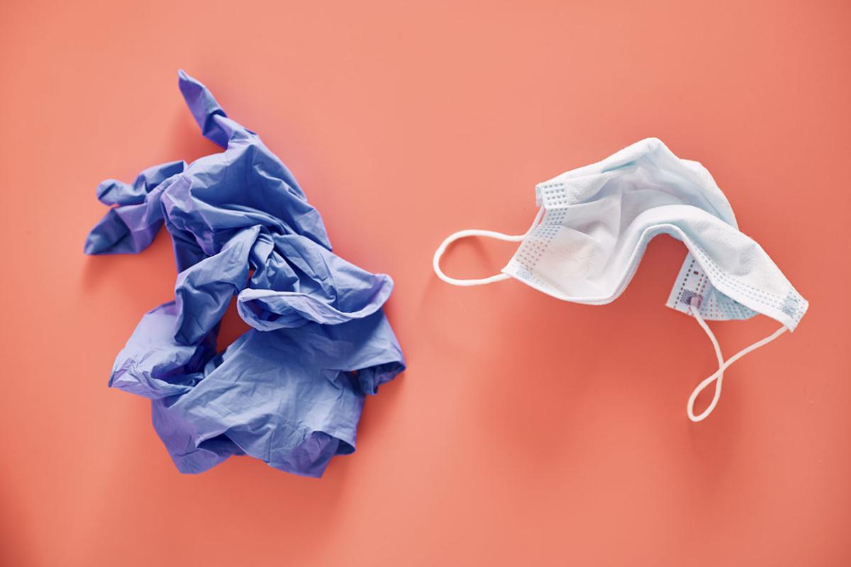 Crumpled gloves and a face mask