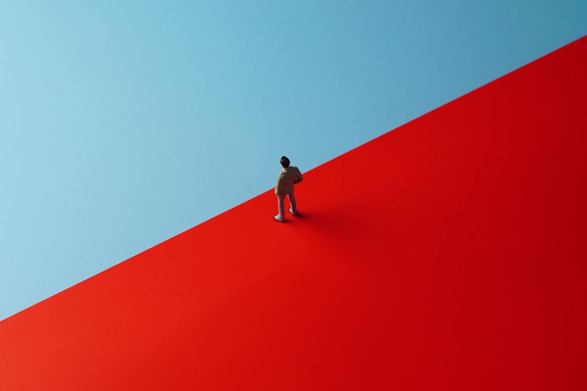 Businessperson standing at a diving line