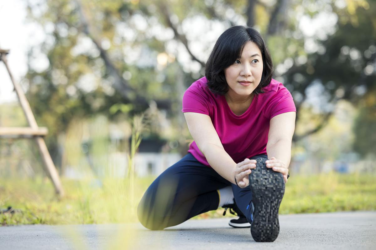 Woman doing legs stretching