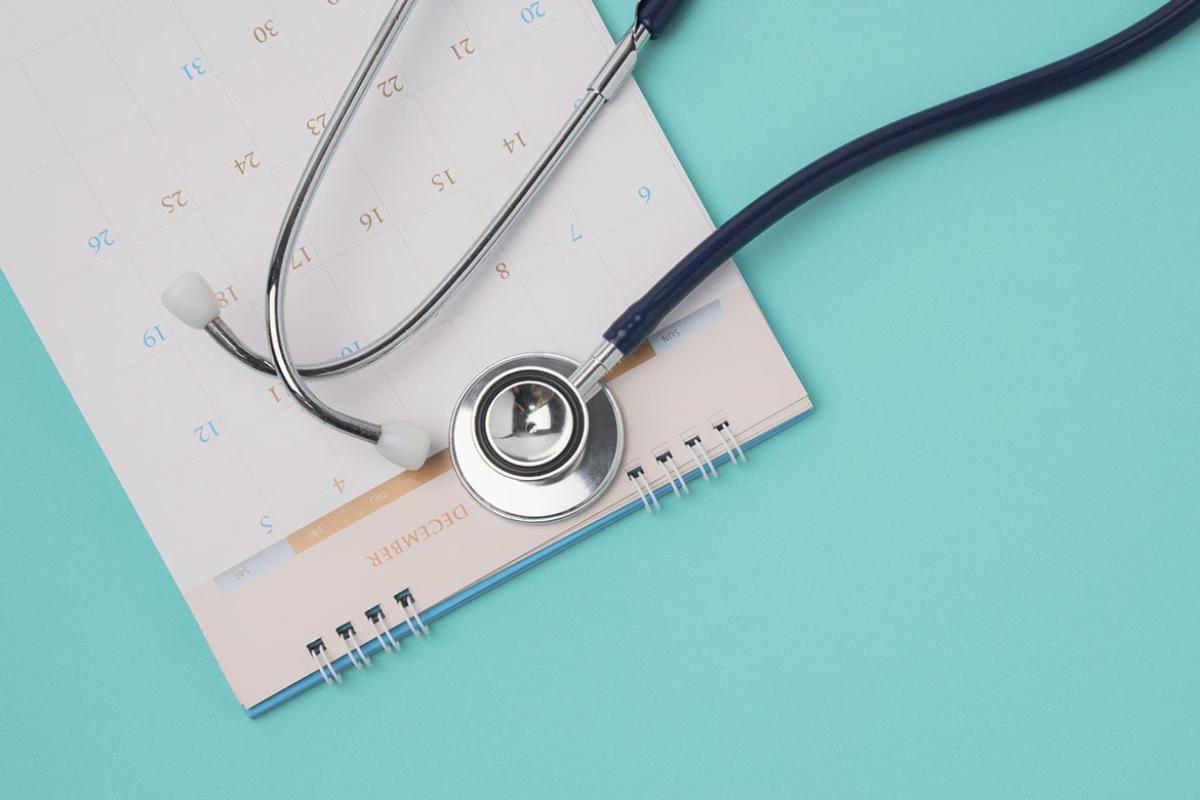 Stethoscope and a calendar