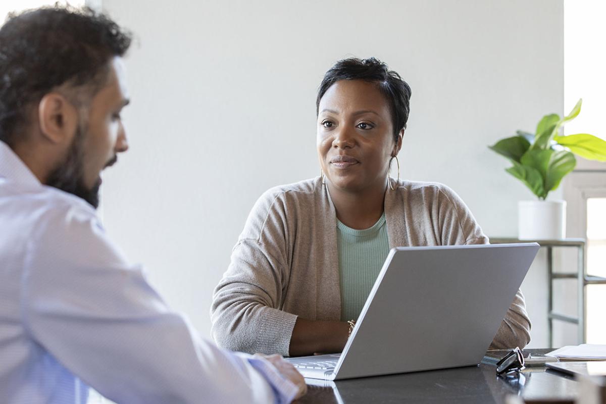 Two people in a meeting