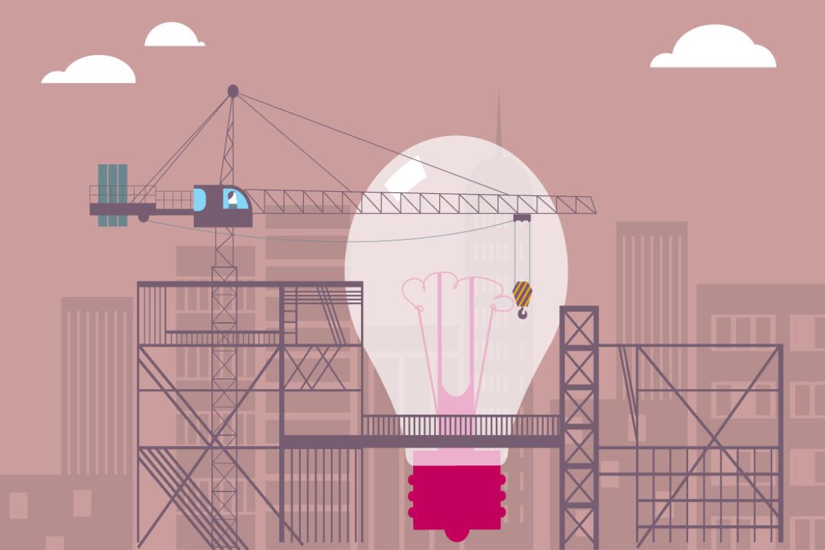 Giant light bulb surrounded by construction
