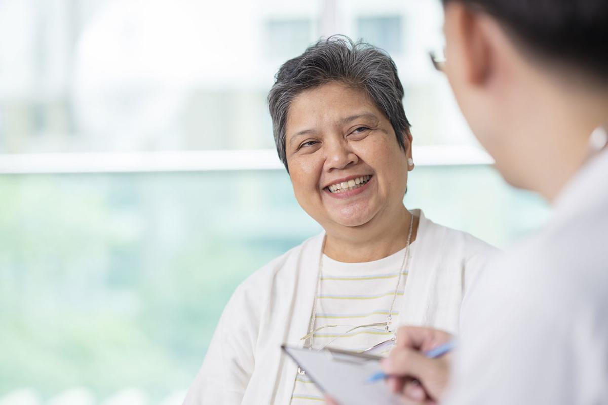 Patient visiting a doctor's office and in conversation