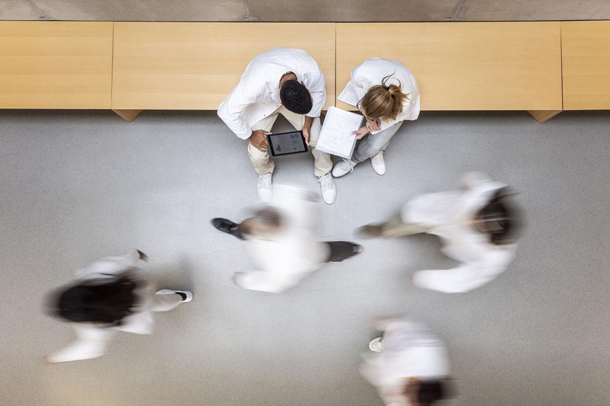 People walking in a corridor