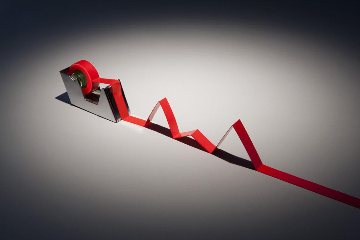 Tape dispenser with red tape