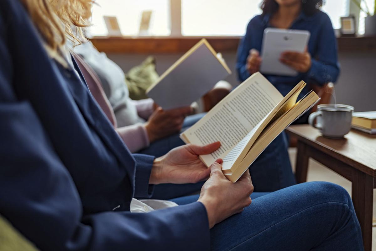 Person holding a book