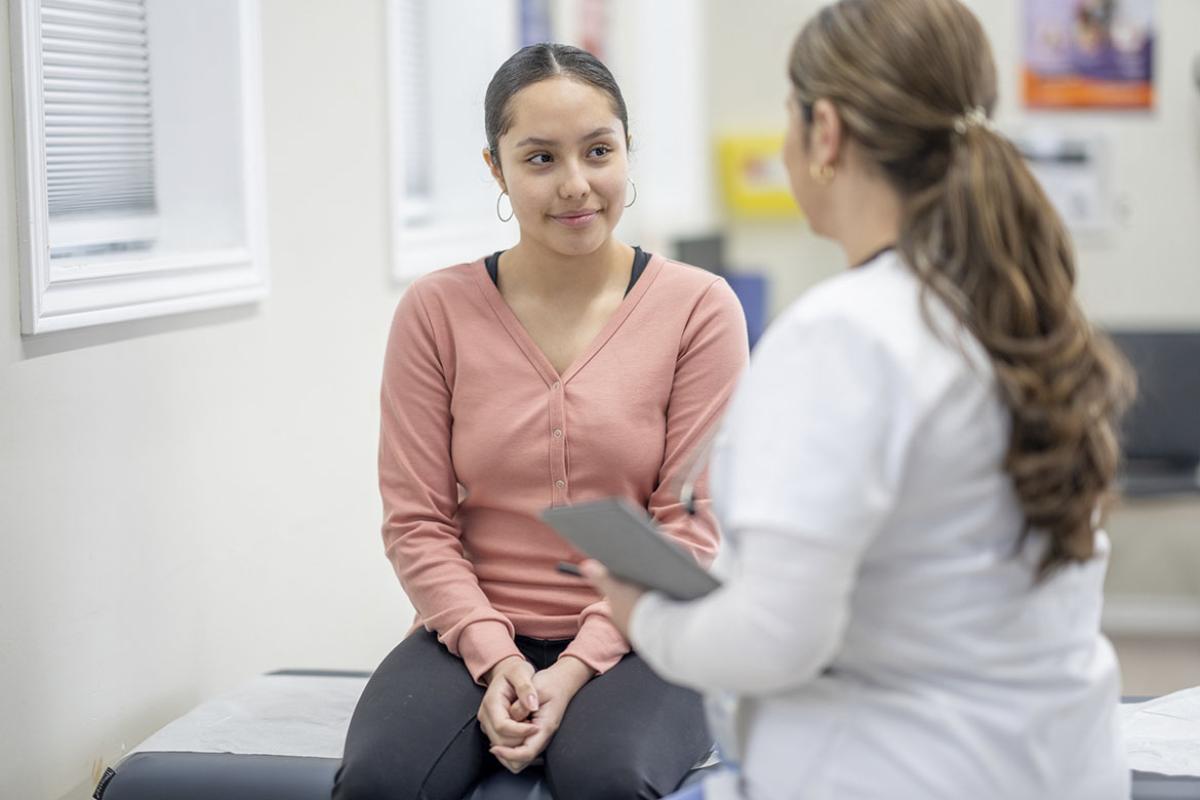 Smiling patient and physician