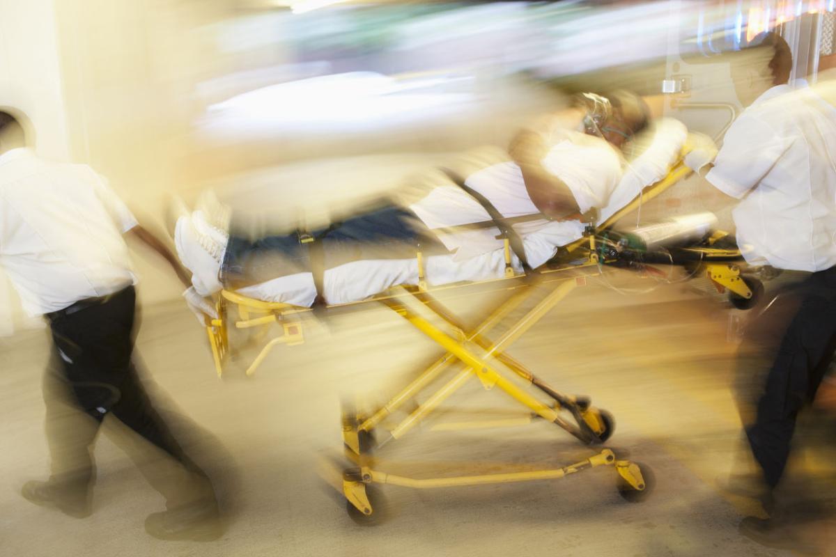 Medics transporting patient to hospital