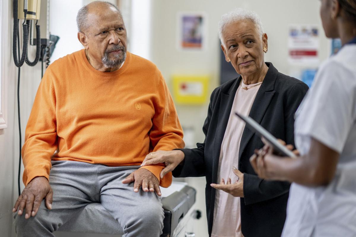 Couple listens to physician