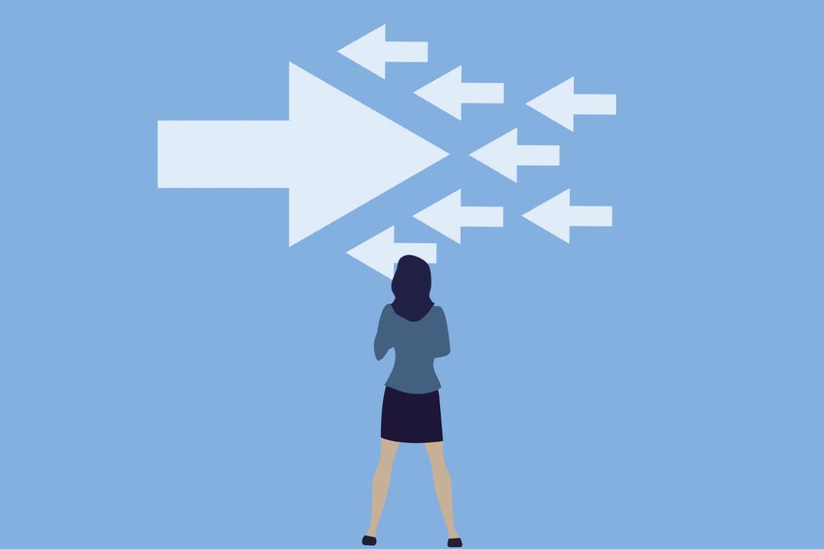 Figure in front of arrows pointing in different directions