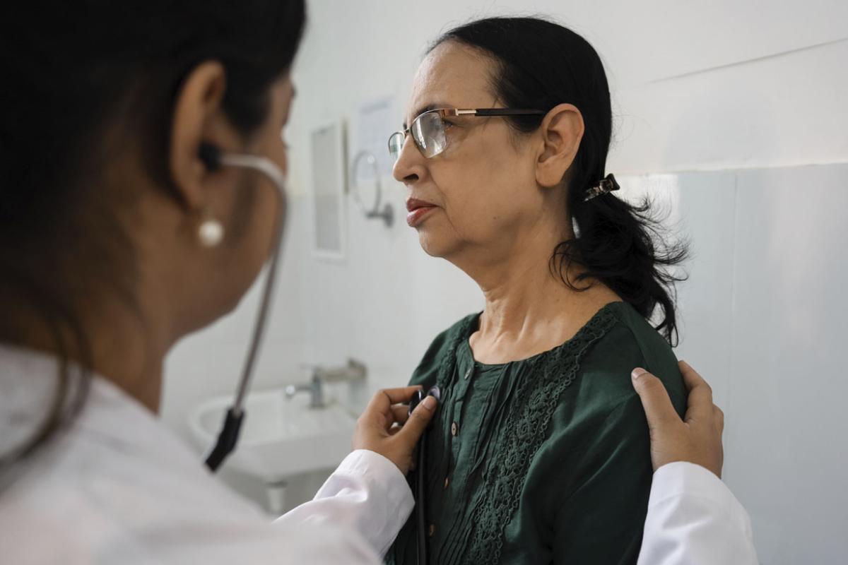 Doctor examines a patient