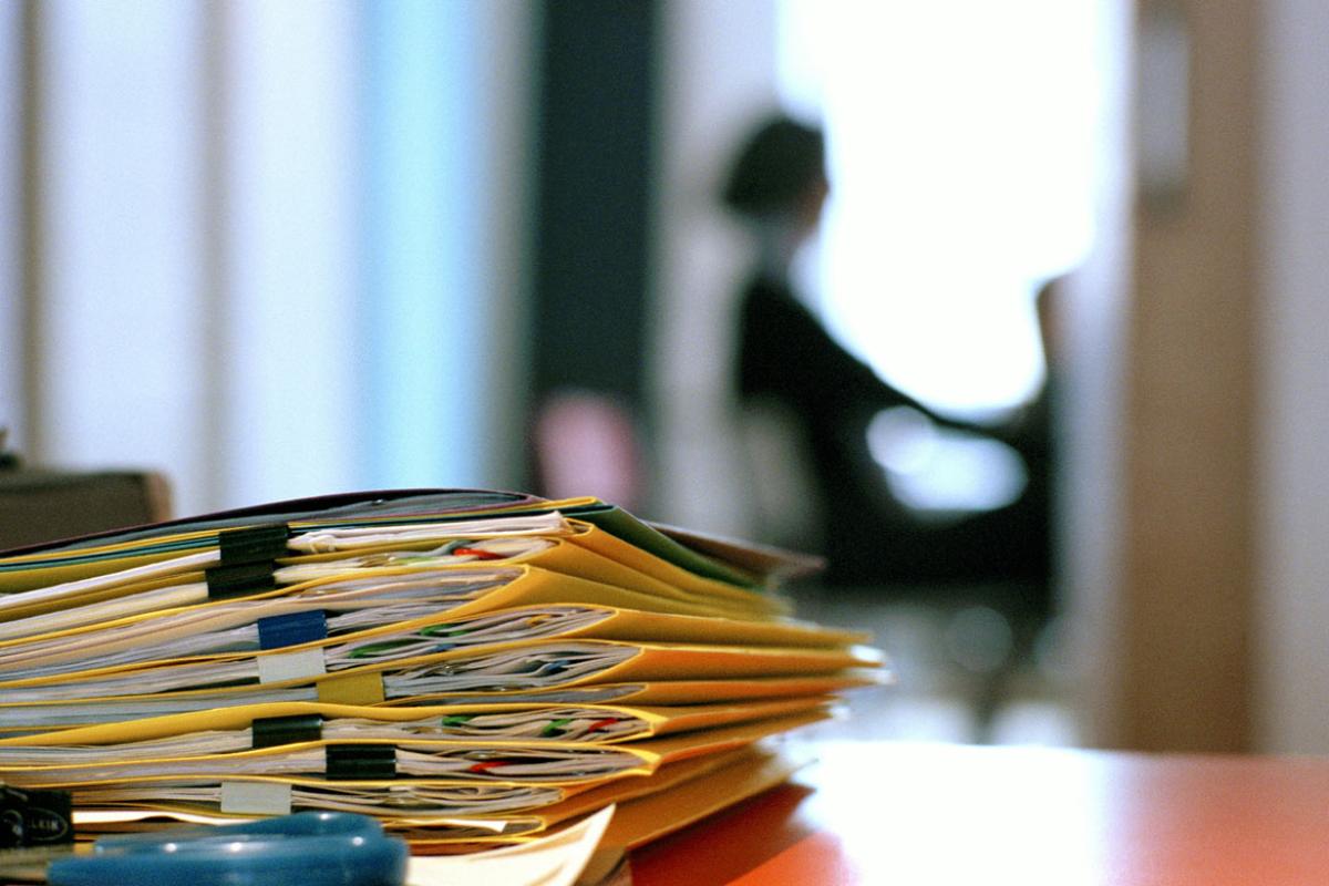 Stack of folders on table