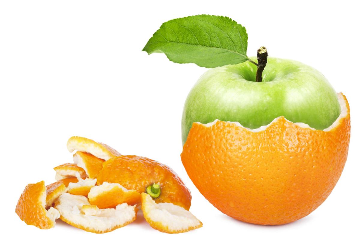 Peeled orange reveals an apple