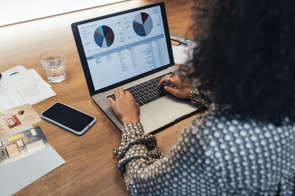 Businessperson working at a laptop