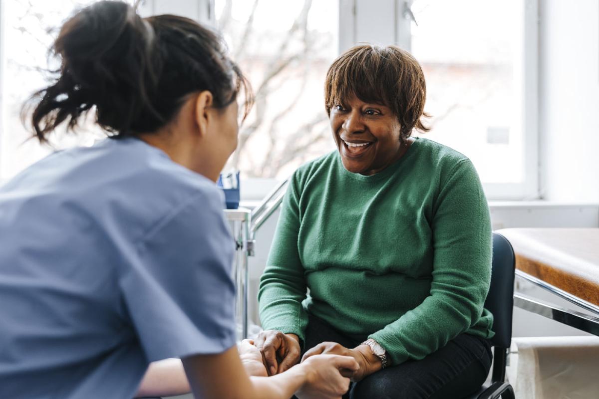 Smiling patient and physician