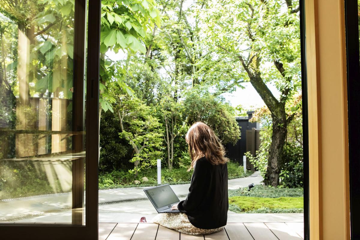 Person working on a laptop outside