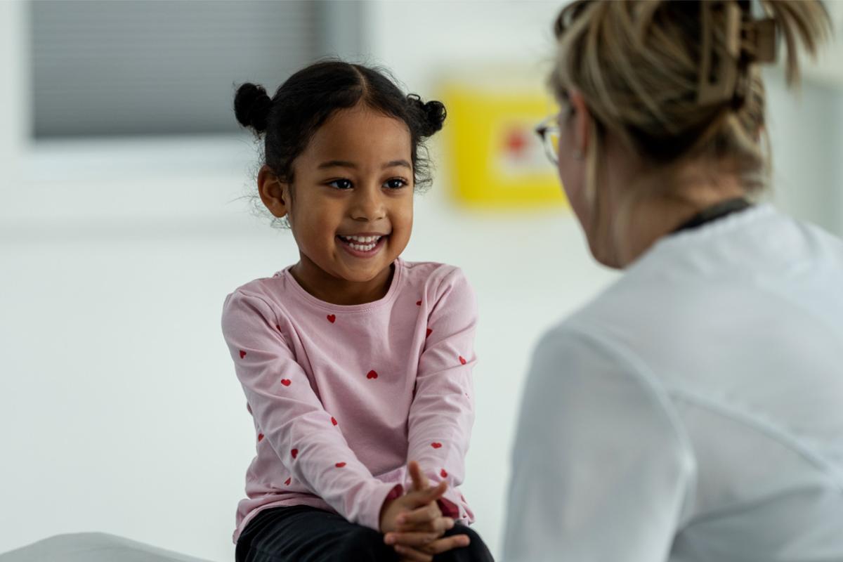 Smiling young patient in doctor's appointment