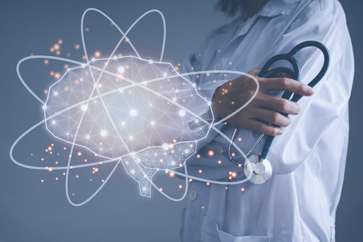 Physician stands by a digital brain