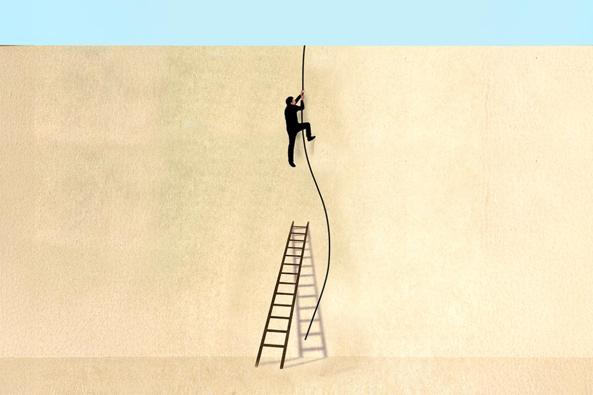 Figure climbs a rope