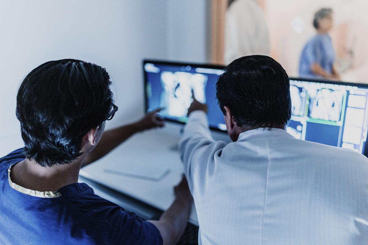 Doctors analyzing medical x-ray