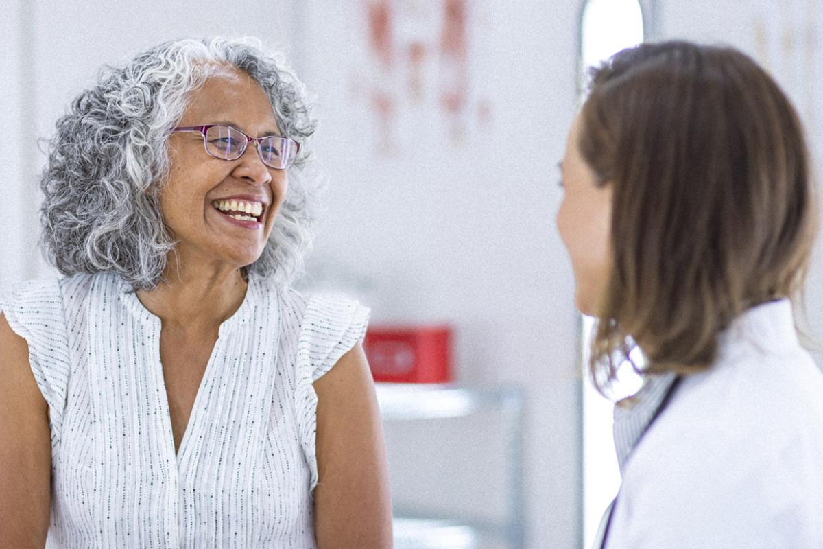 Patient smiles at physician