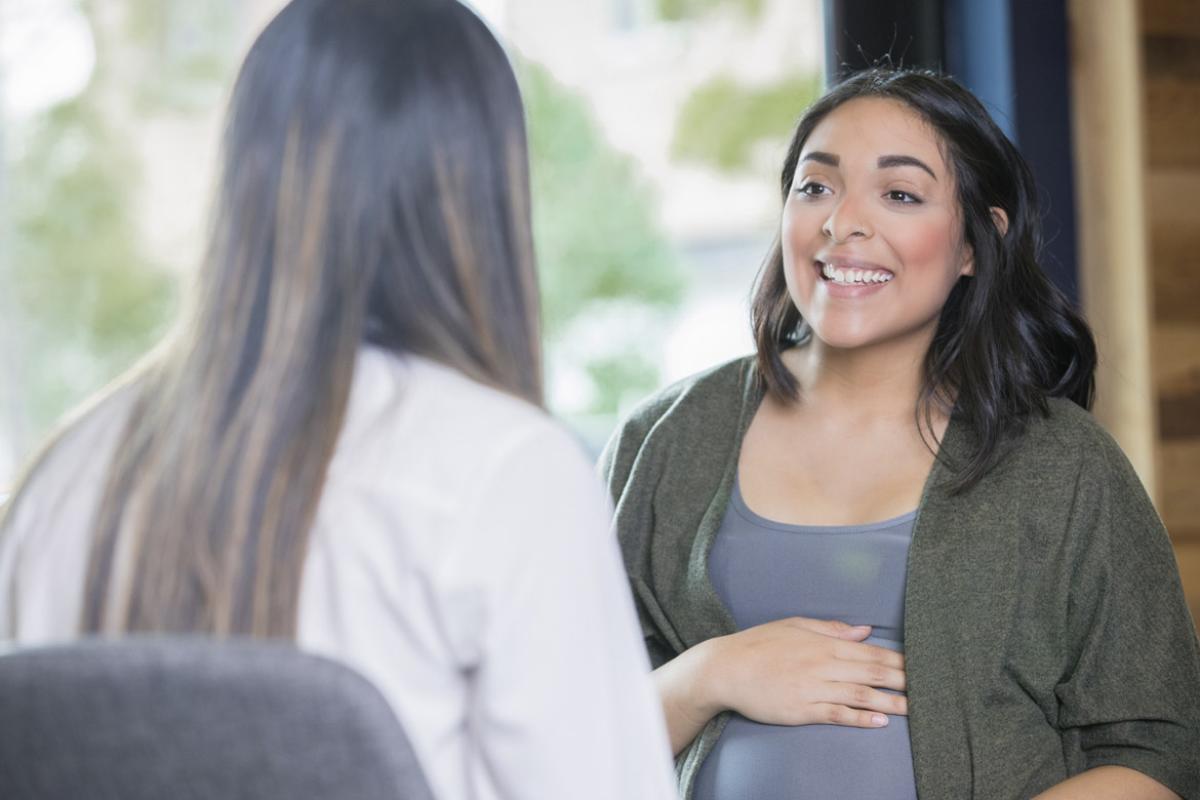 Smiling pregnant patient