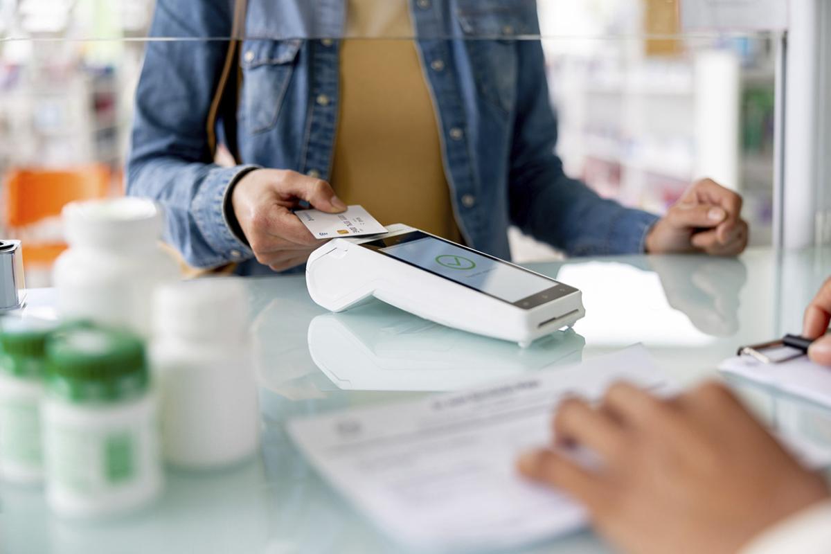 Customer making a contactless payment