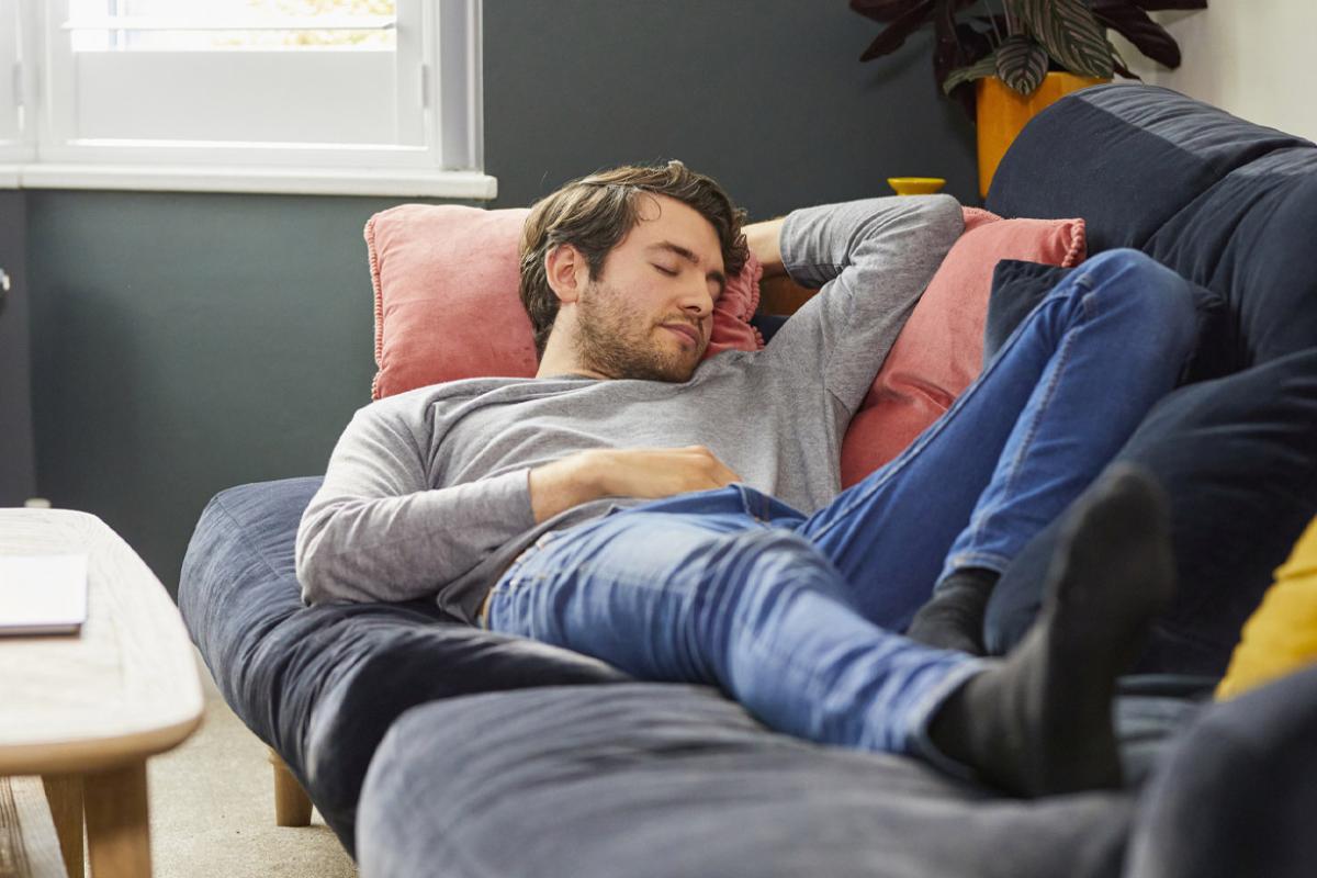 Taking a nap on a couch