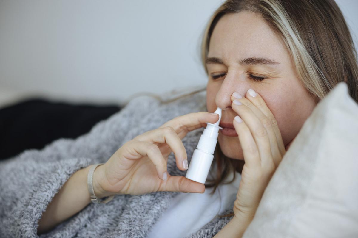 Ill patient uses nasal spray