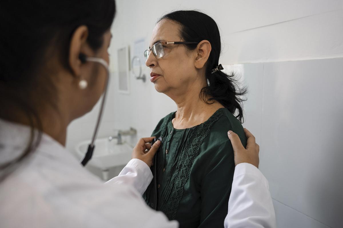 Doctor examines a patient