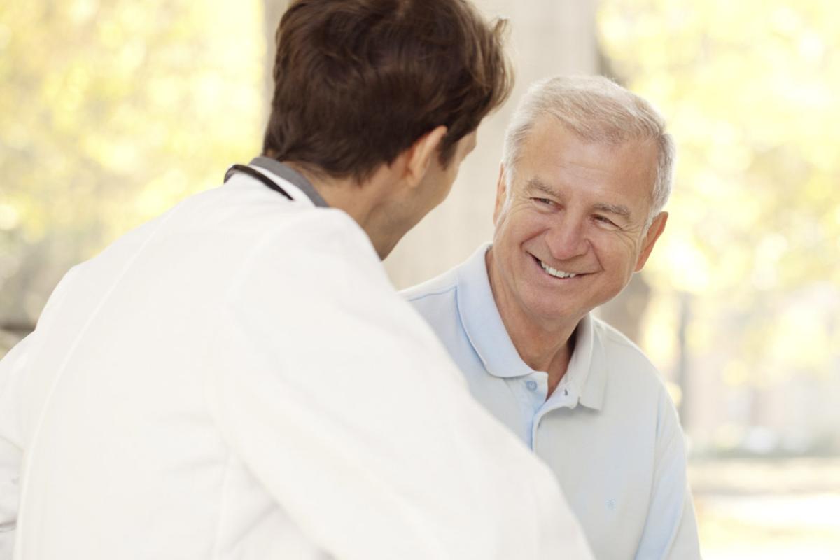 Patient smiles at physician