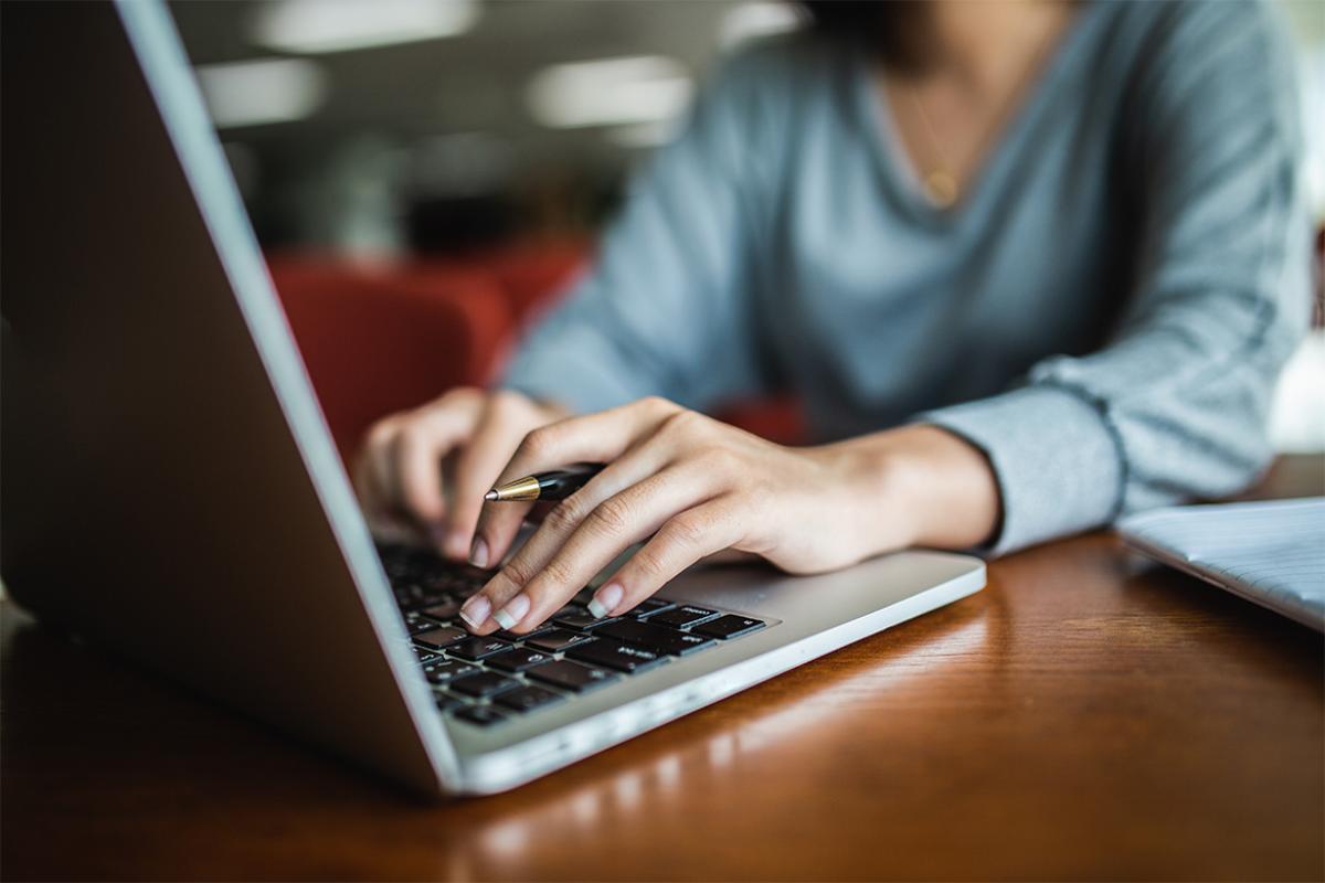 Person working at a laptop