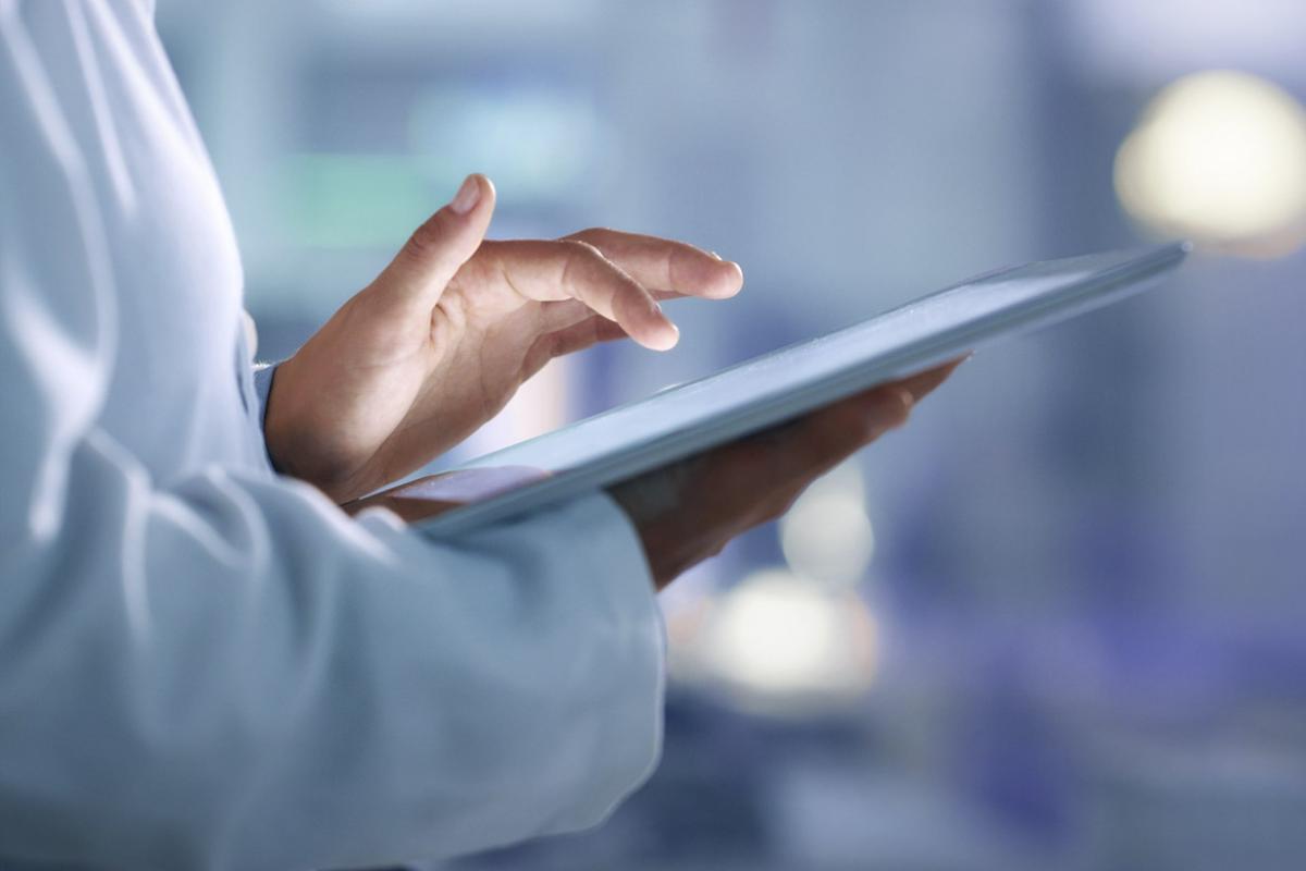 Physician uses tablet