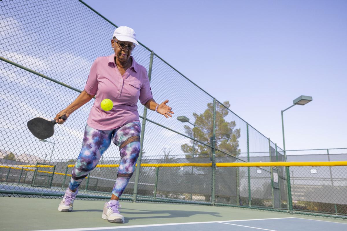 People playing pickleball on outdoor courts