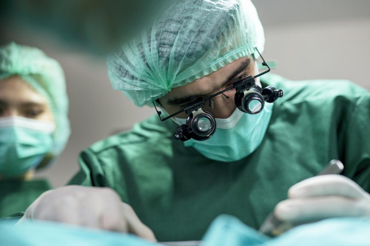 Surgeons operating