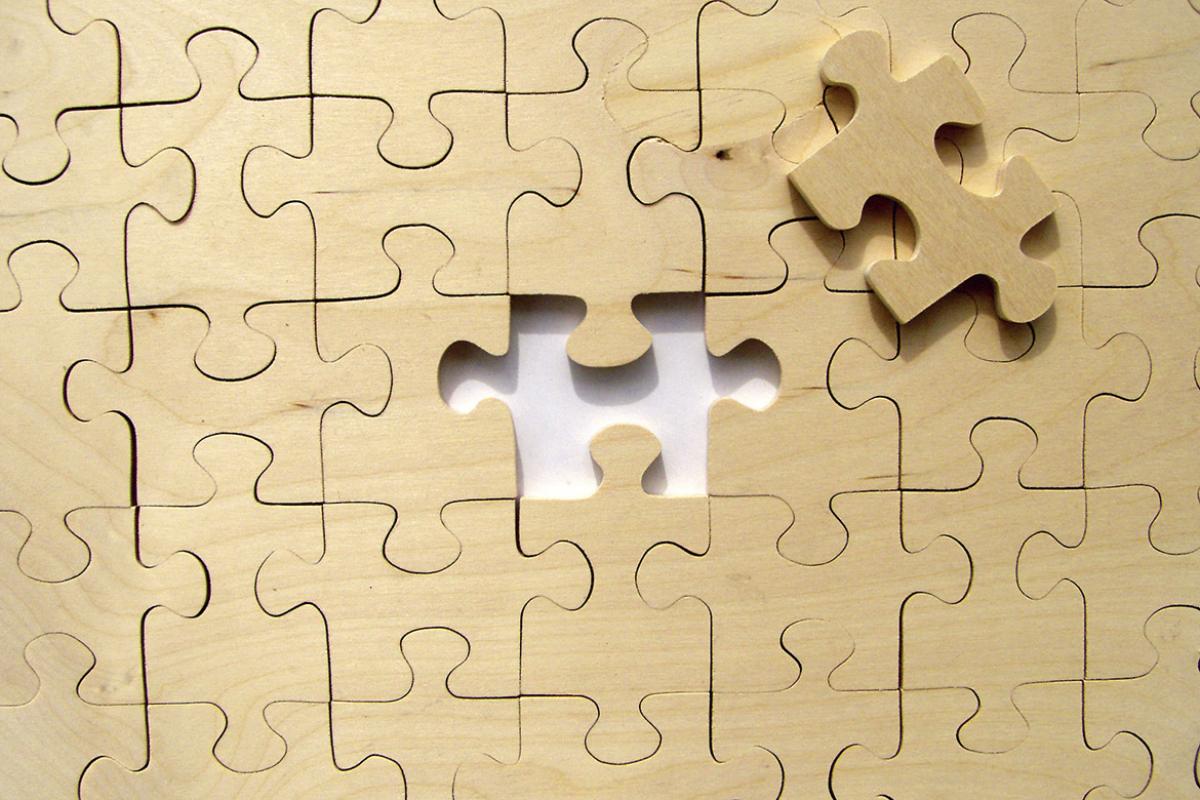Puzzle with one piece missing
