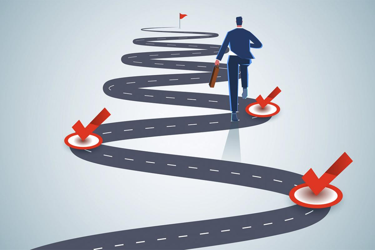 Figure advances up a winding road