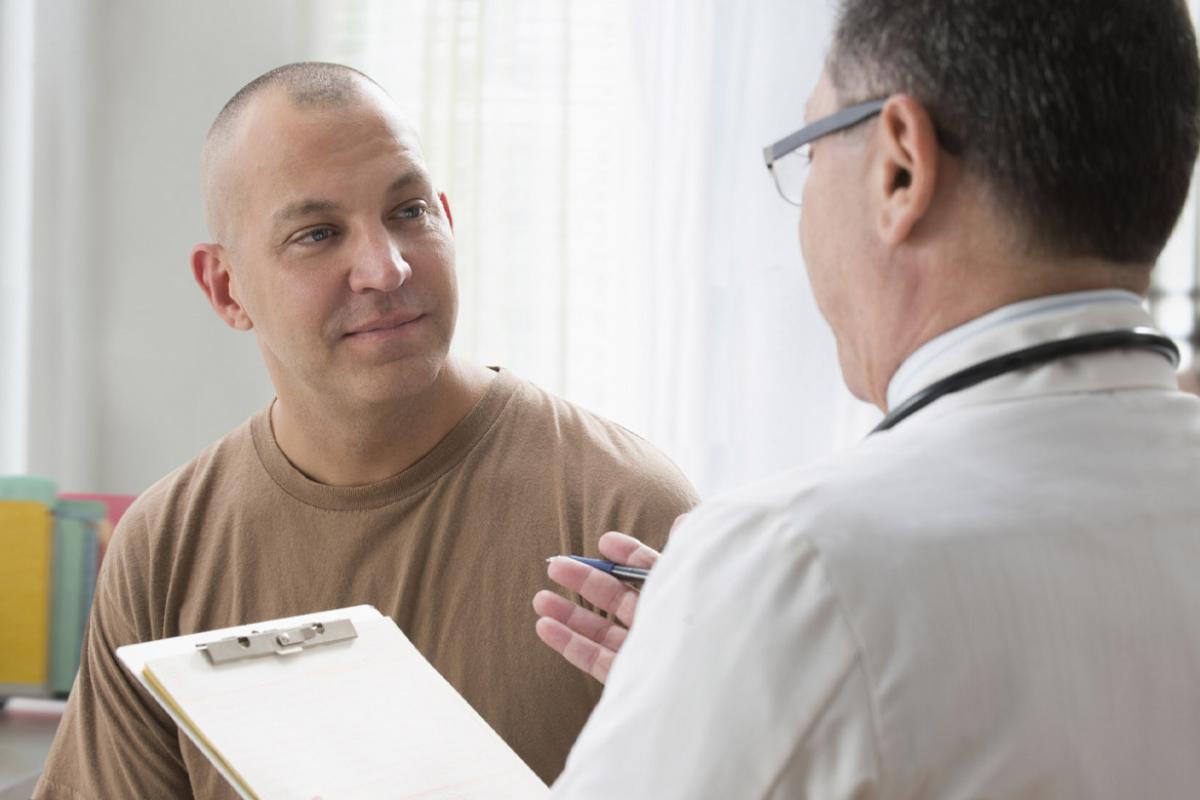Patient listens to doctor during an appointment