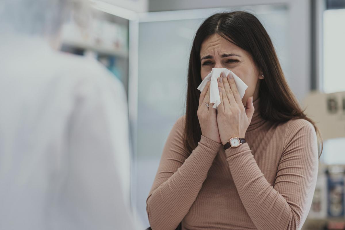 Patient holds facial tissue